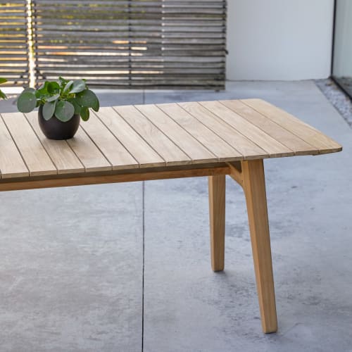 Table de jardin en fibre-ciment blanc et bois 200 x 100 cm OLBIA