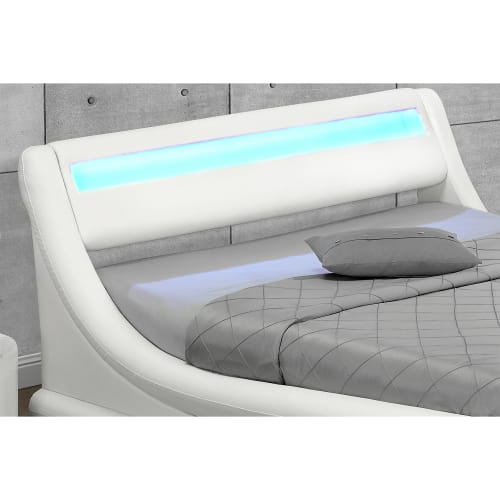 Struttura letto in similpelle bianca con contenitore e LED 140x190 cm  PORTLAND