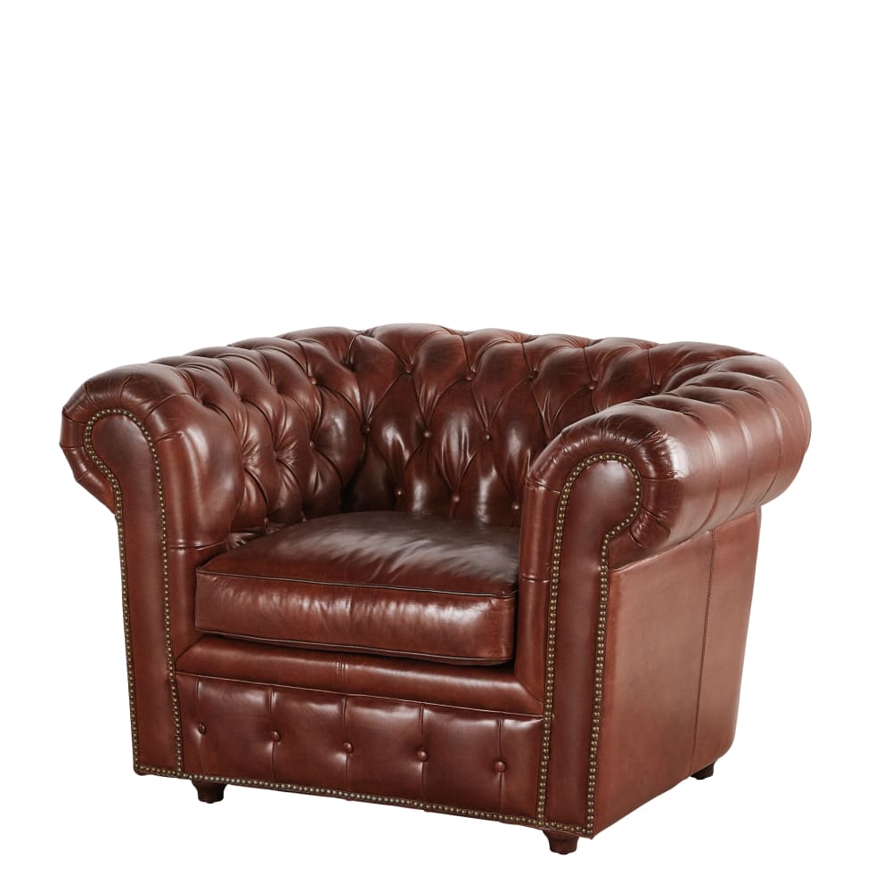 Fauteuil capitonné en cuir marron