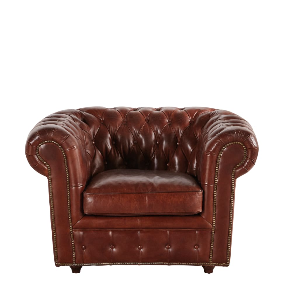 Fauteuil capitonné en cuir marron