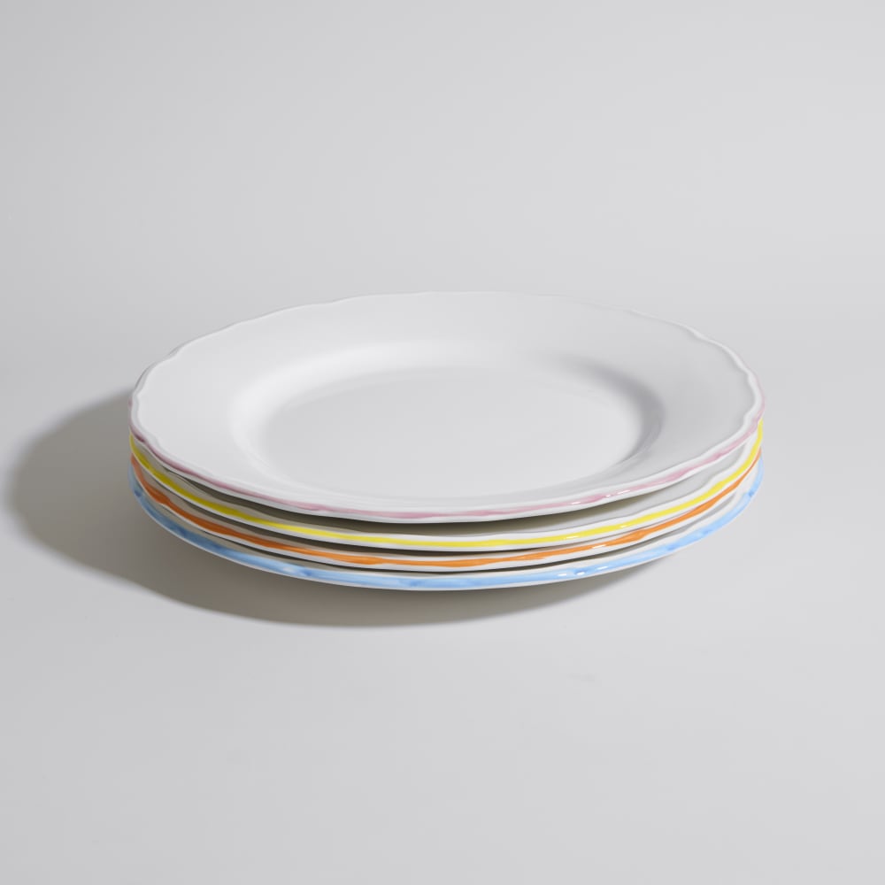Assiettes plates en porcelaine blanche et bords multicolore (x4)
