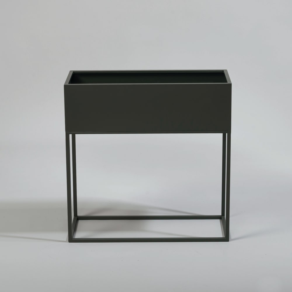 Jardinière en fer forgé vert