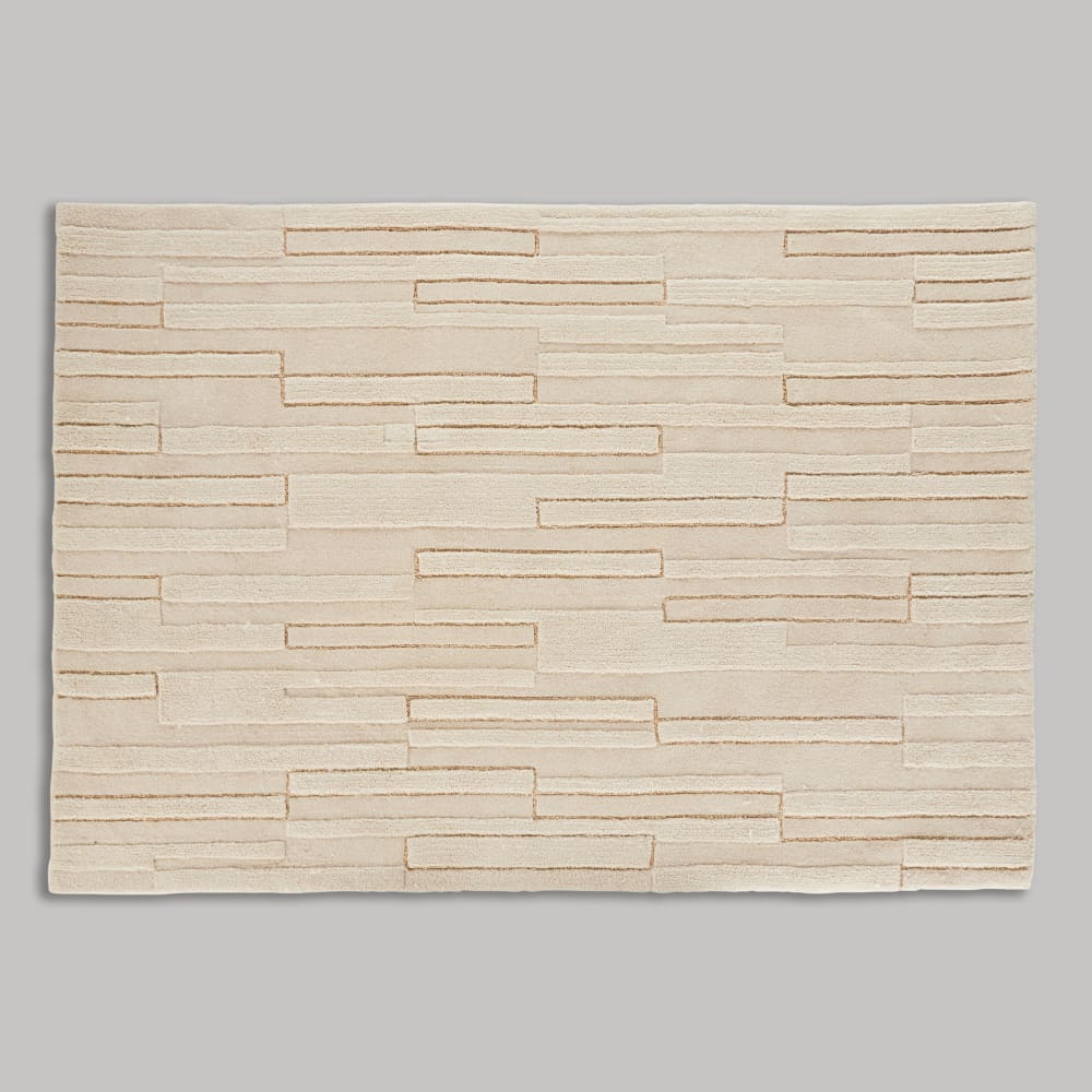 Tapis en laine tuftée, reliefs crème et dorés 160x230