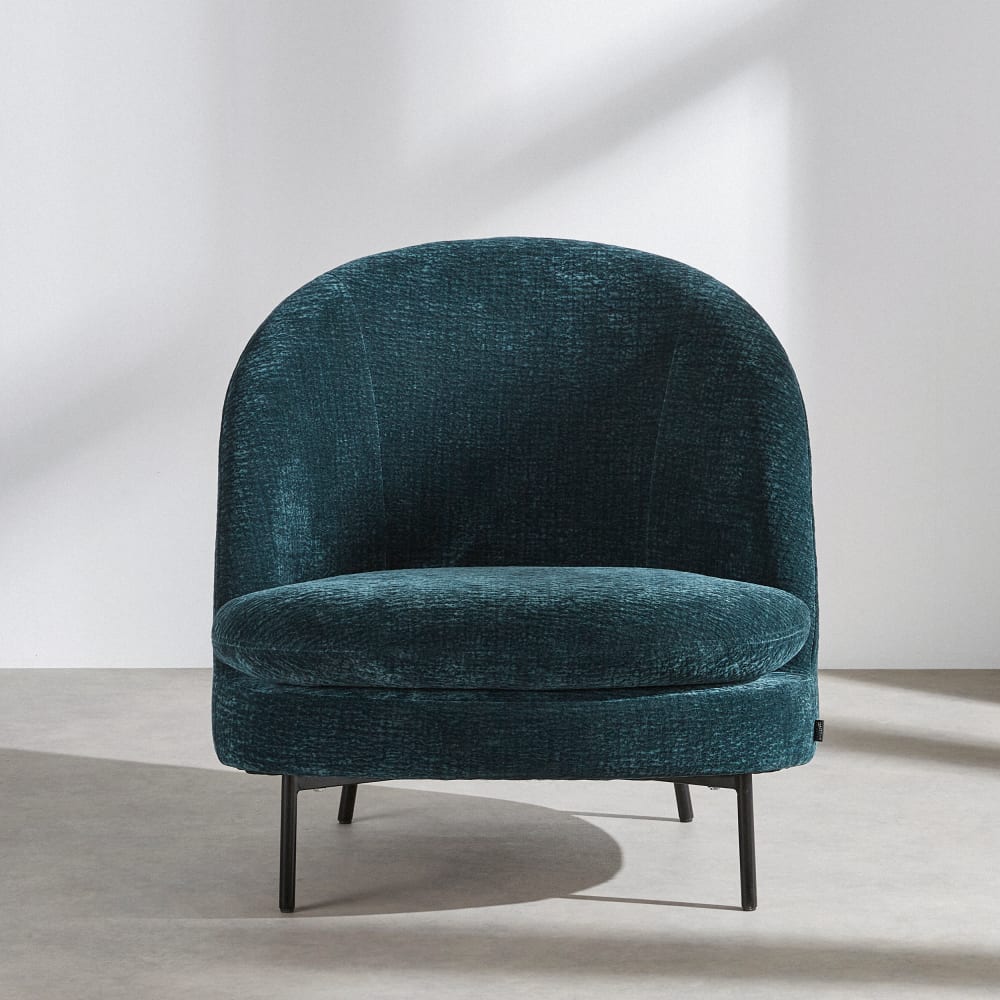 Fauteuil en tissu texturé bleu pétrole