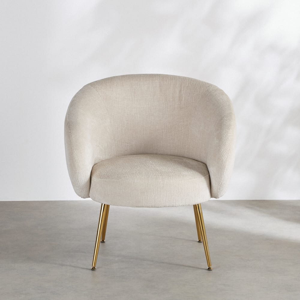 Fauteuil en textile chenille beige et pieds en acier doré