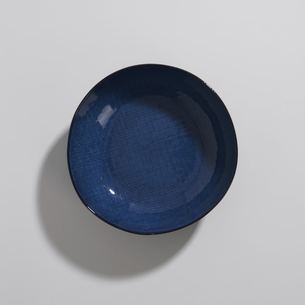 Assiette creuse en céramique bleue