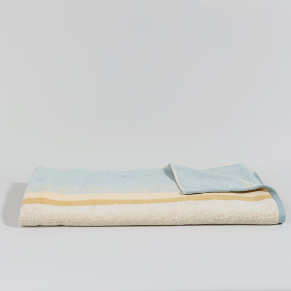 Serviette de plage en coton bio à rayures tricolores 90x180