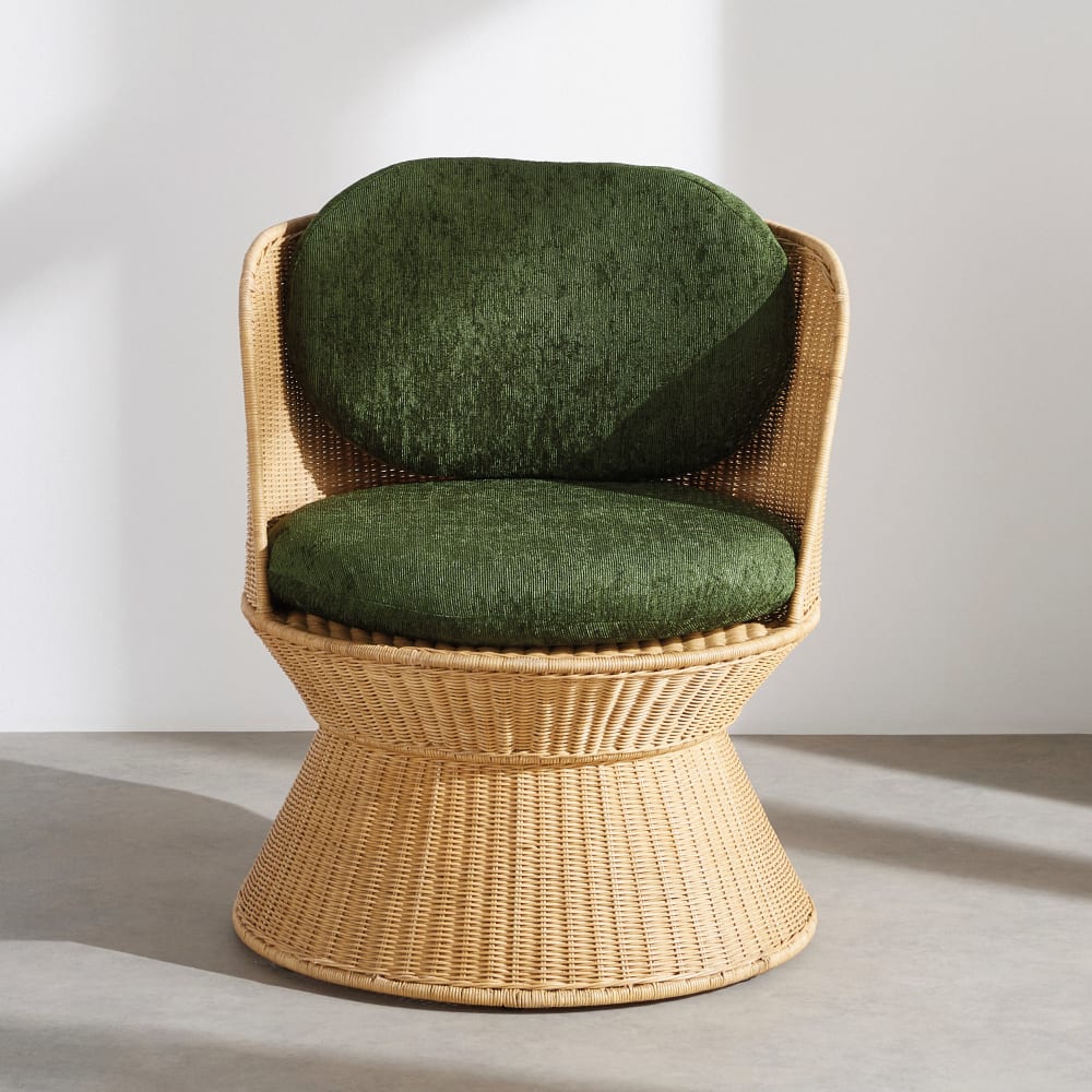 Fauteuil en rotin et coussins vert