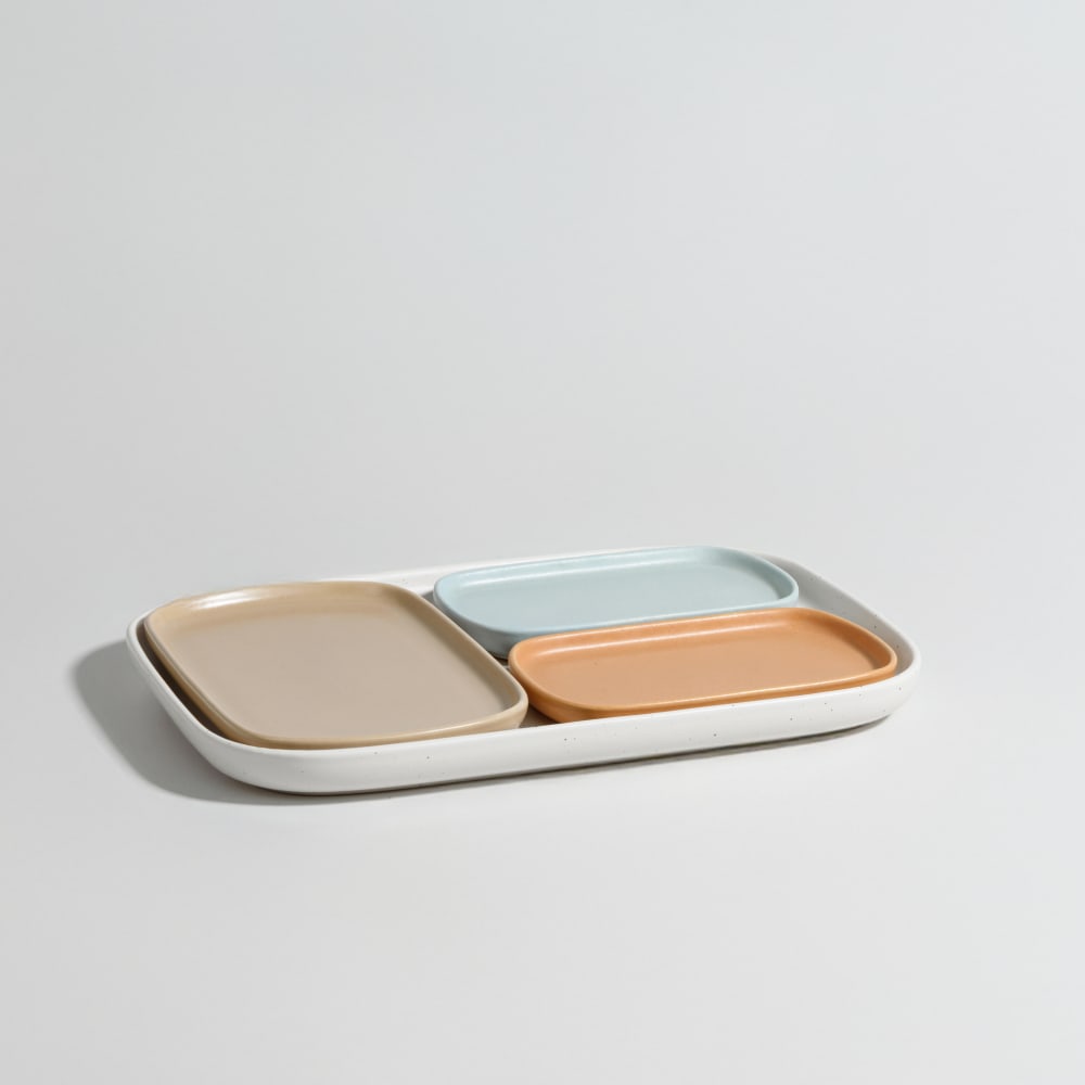 Coupelles apéritives ovales (x4) en céramique blanche, beige, marron et bleue