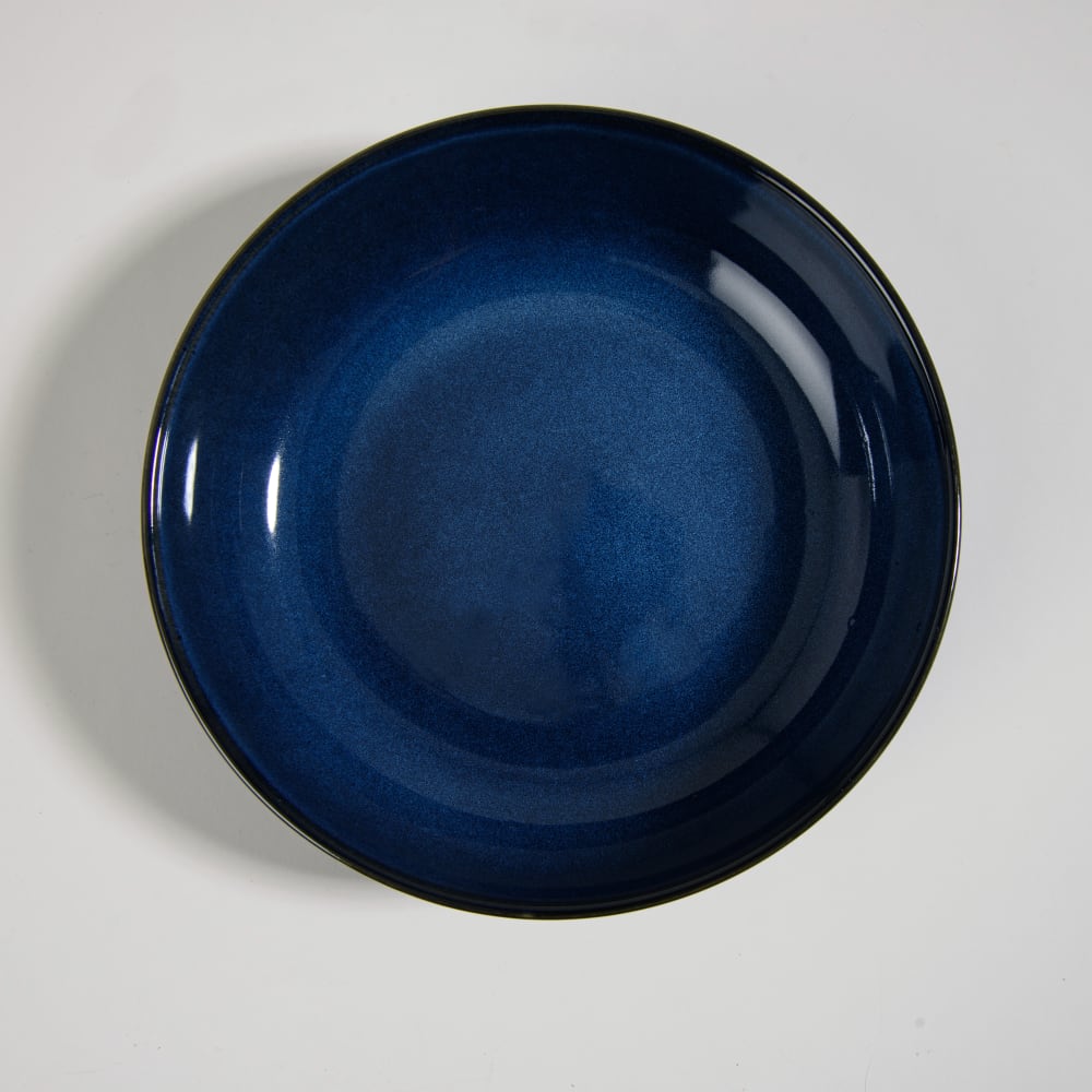 Assiette creuse en céramique bleue