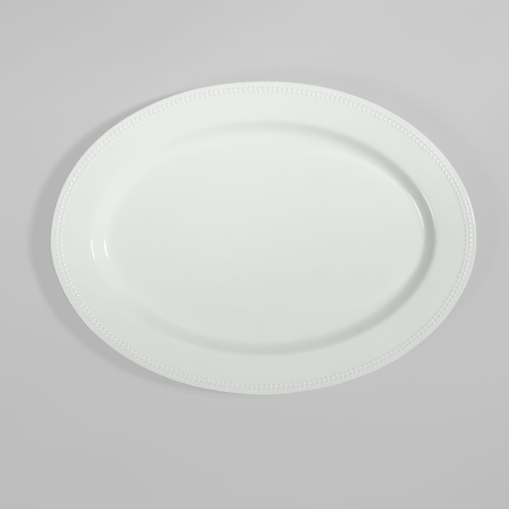 Plat de présentation en céramique blanche et liseré en relief