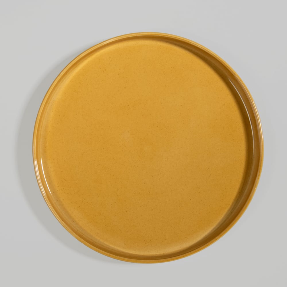 Assiette plate en céramique jaune ocre Assiette plate en céramique jaune ocre