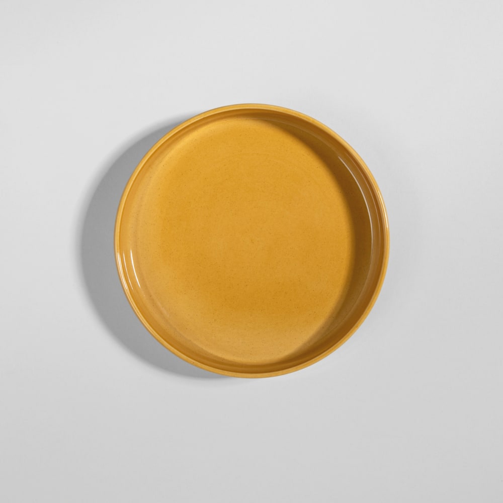 Assiette creuse en céramique jaune ocre