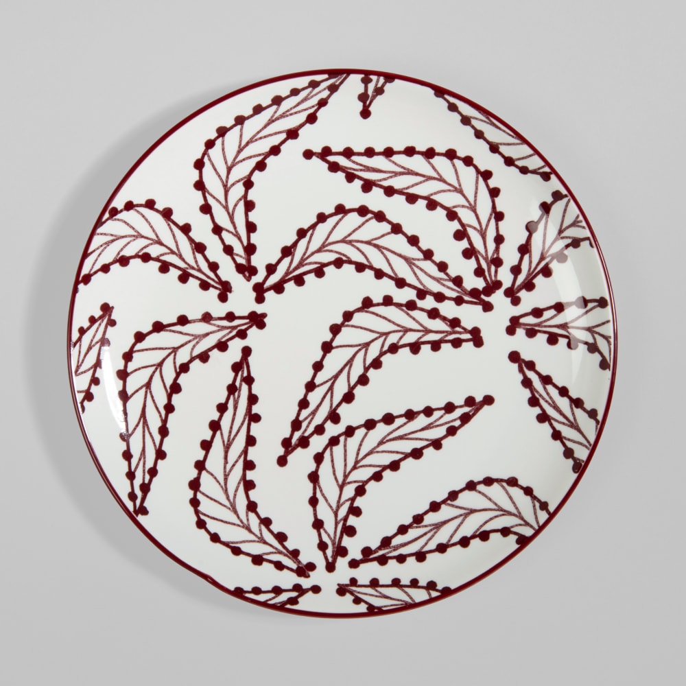Assiette plate en céramique blanche et motif feuilles aubergine