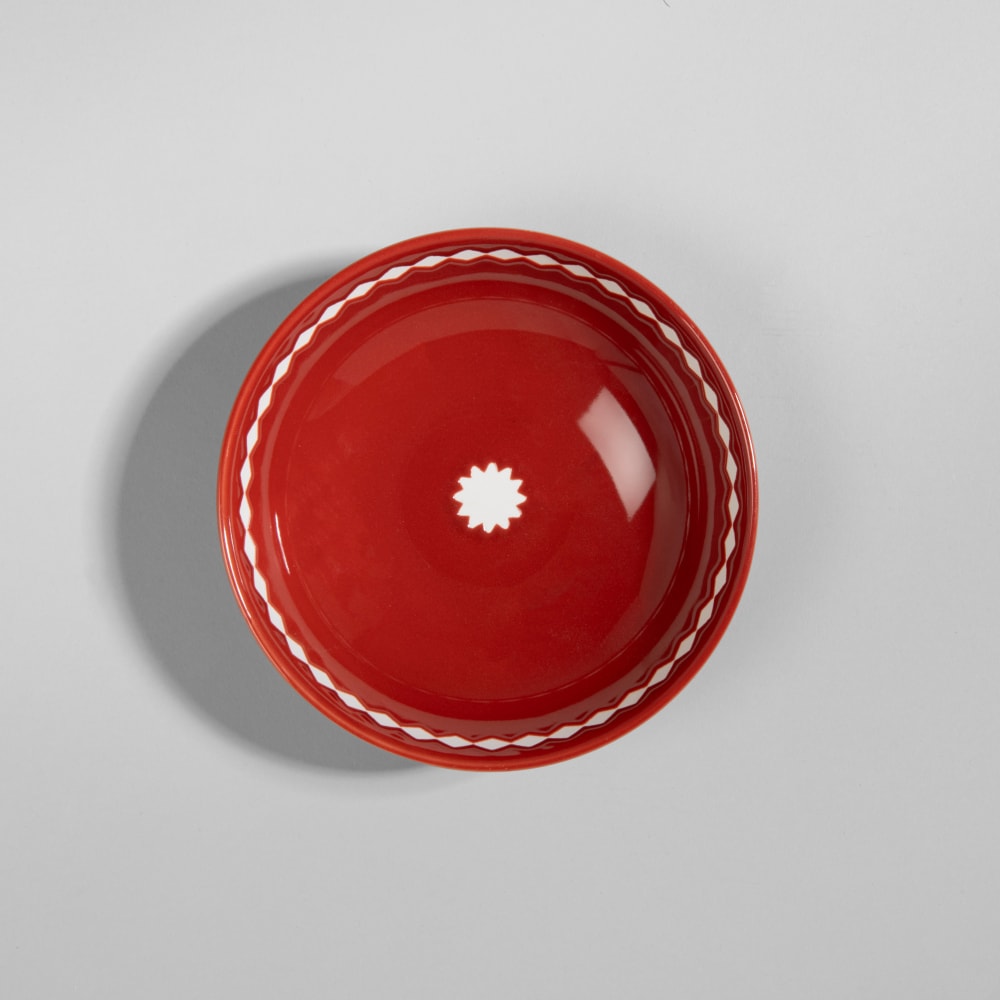 Assiette creuse en céramique orange