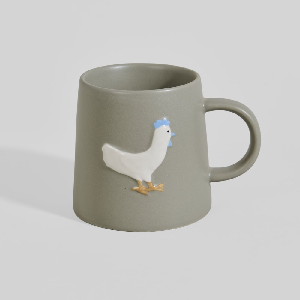 Mug en grès gris motif poule en relief