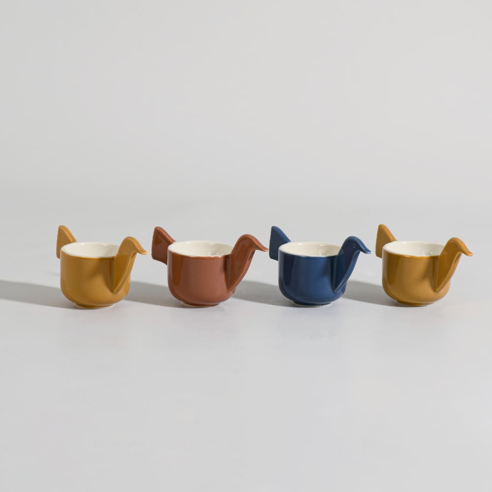 Coquetiers oiseaux (x4) en grès bleu, jaune et marron Coquetiers oiseaux (x4) en grès bleu, jaune et marron