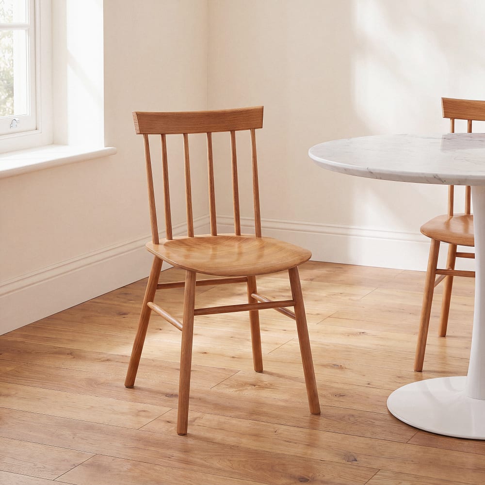 Chaise bistrot à barreaux en hévéa massif