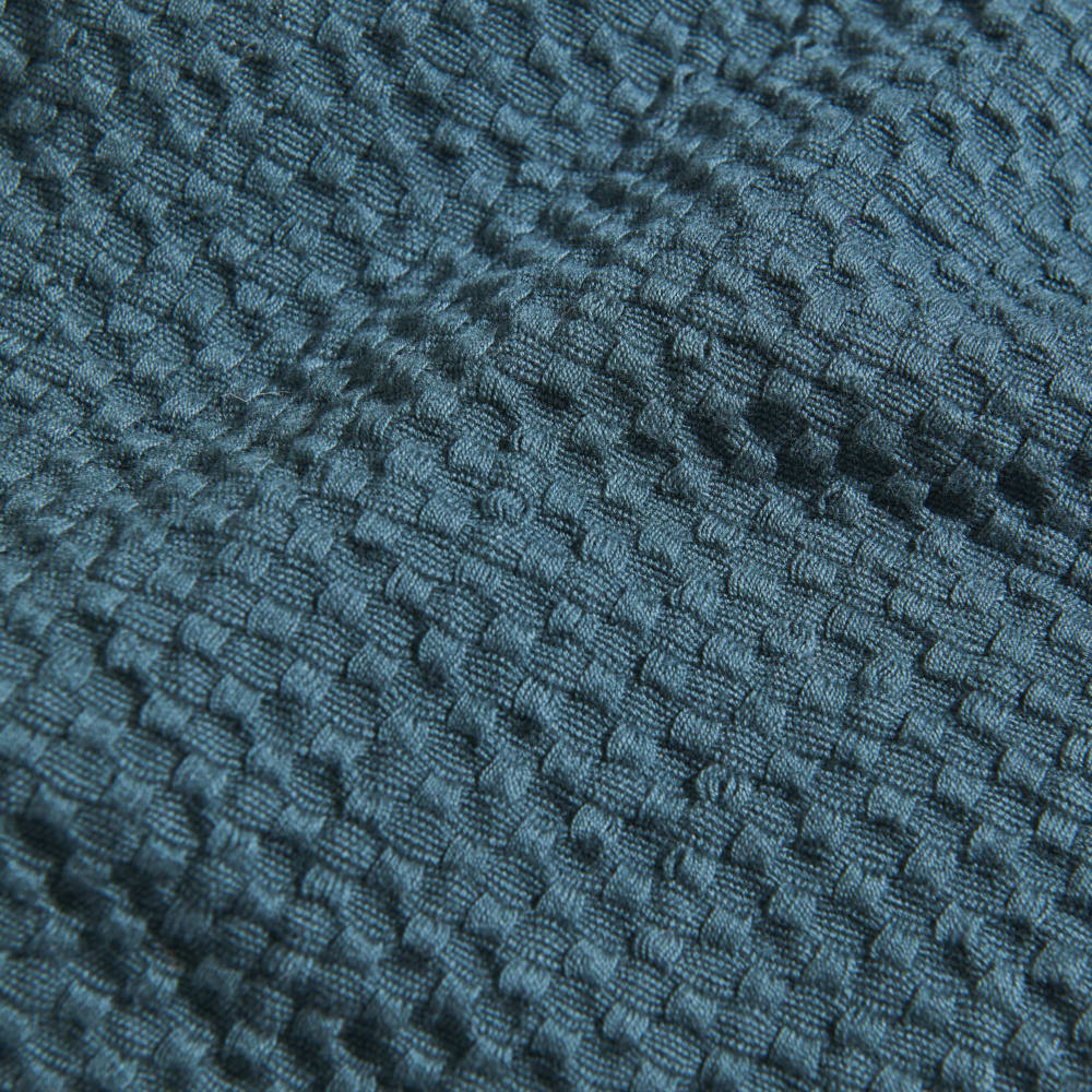 Gewebtes, geprägtes Baumwoll-Plaid in Grün mit Fransen, 130 x 170