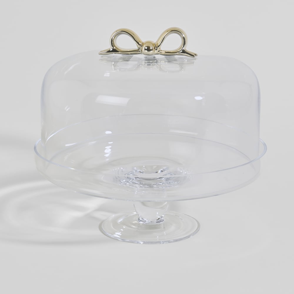 Cloche à gâteau en verre transparent avec nœud doré