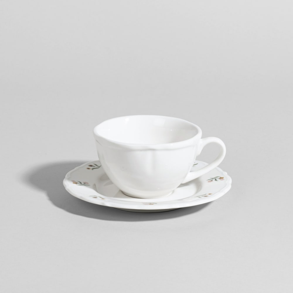 Tasse à café en porcelaine blanche à motifs