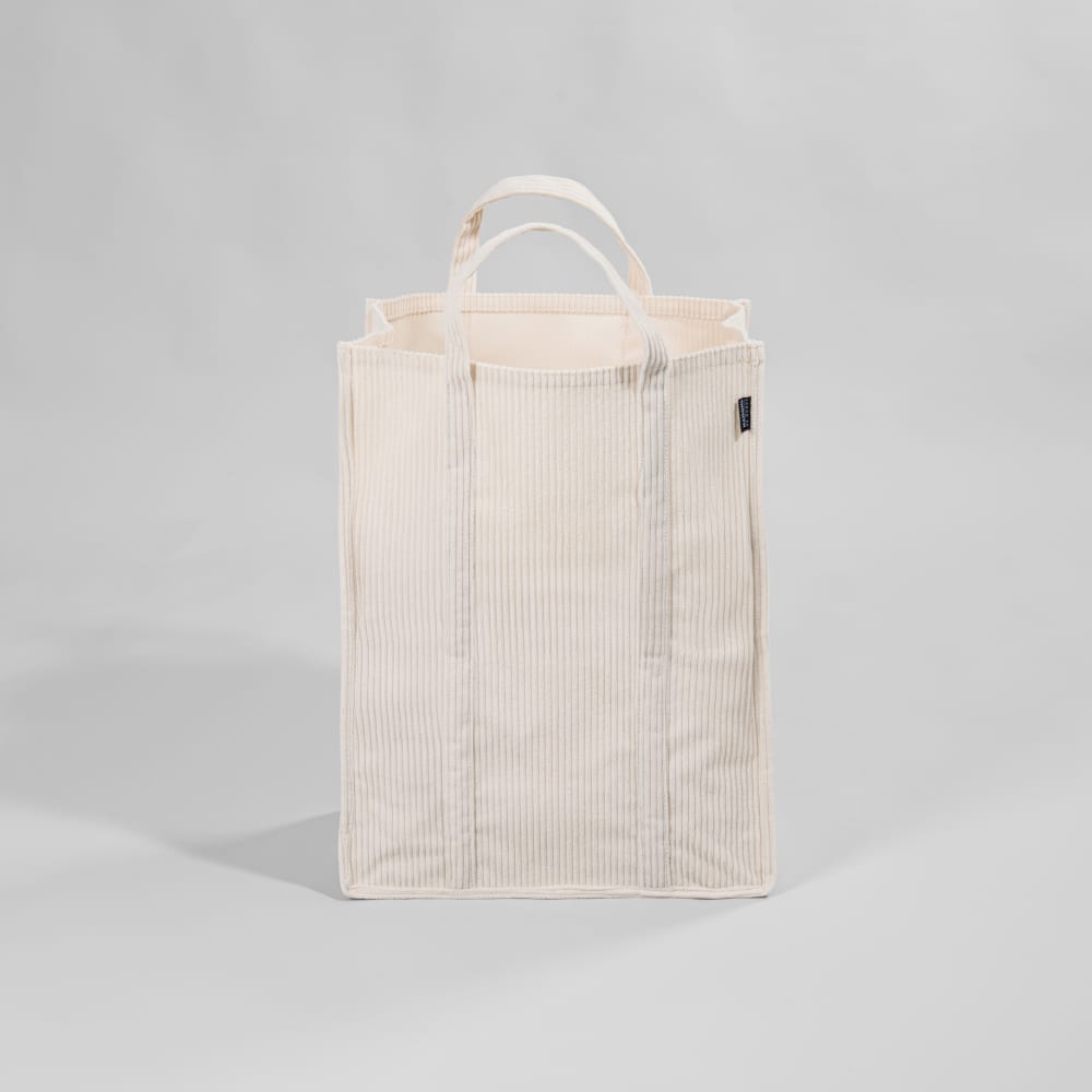 Panier à linge pliable en tissu polyester effet velours écru