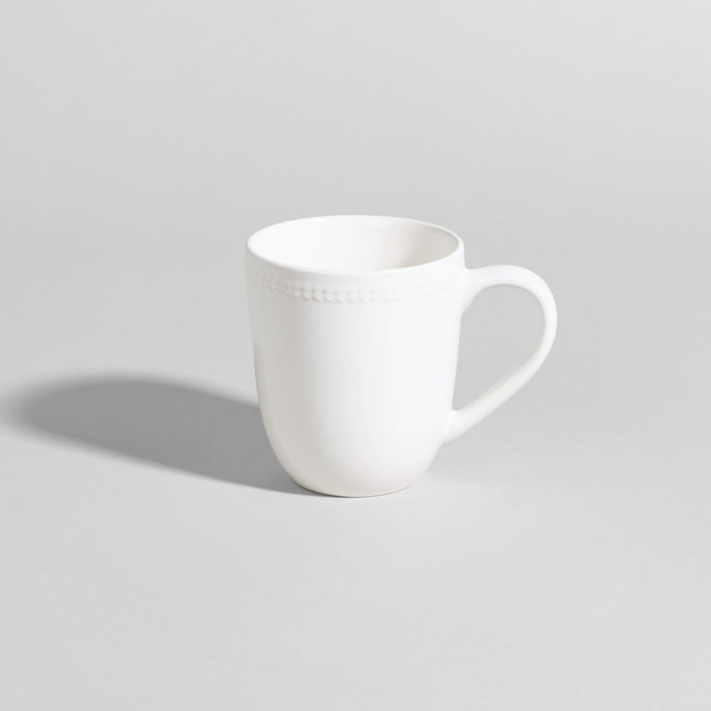 Mug en céramique blanche et liseré en relief