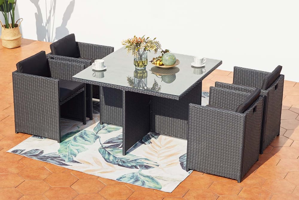 Salón de jardín encastrable 4 personas de resina trenzada negro/negro