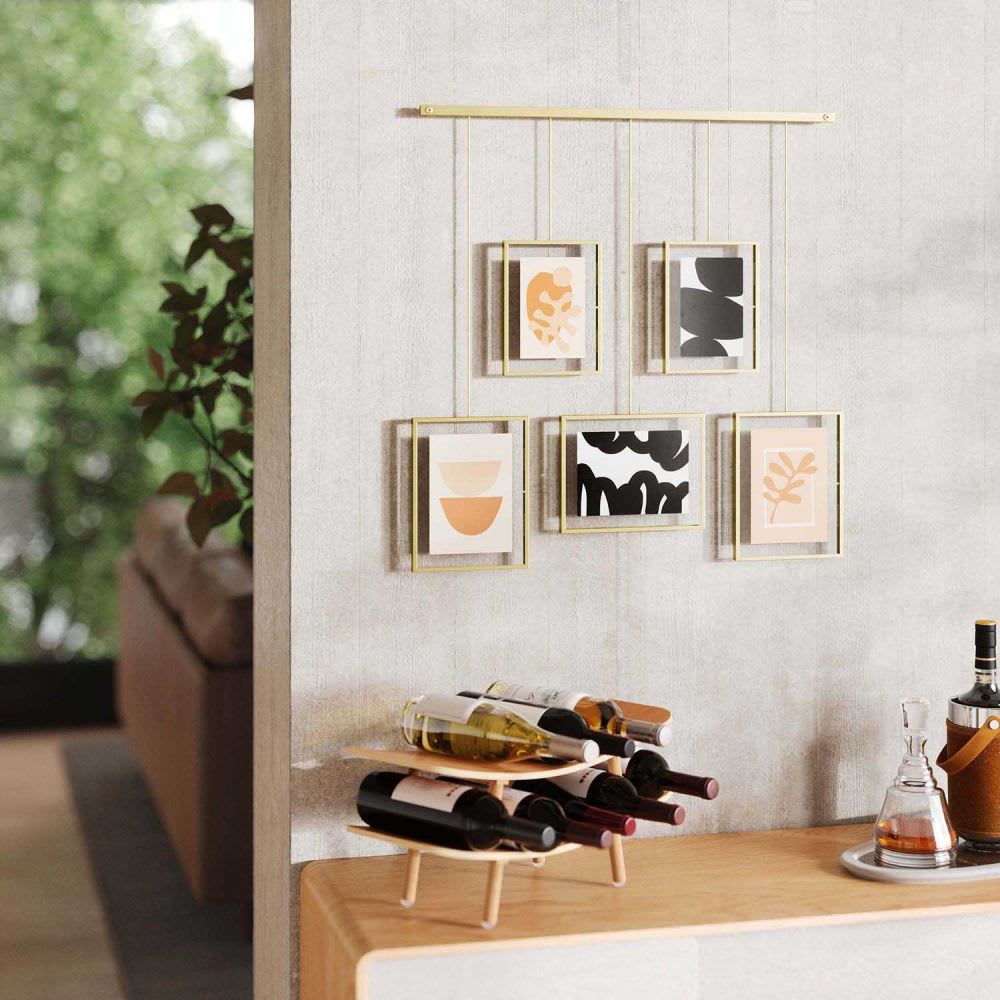 Porte photos mural pour 5 cadres métal doré - Maisons du Monde