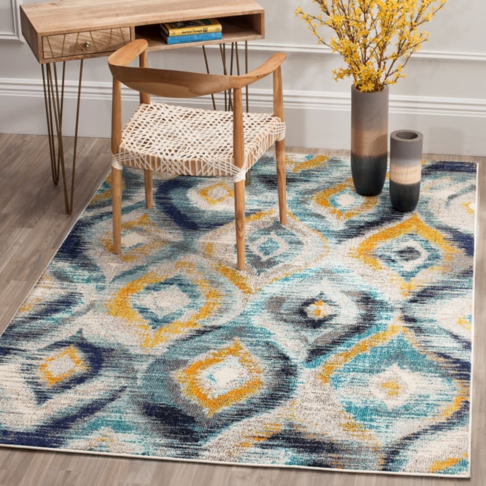 Tapis bohème chic en polypropylène bleu/multicolore, 155 x 231 cm