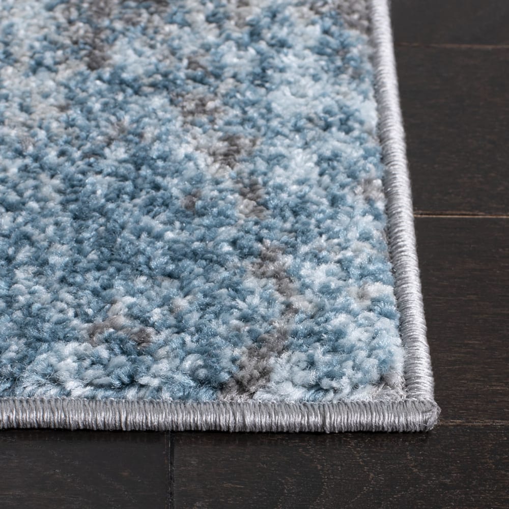 Tapis contemporain en polypropylène gris/bleu, 91 x 152 cm — vue 4