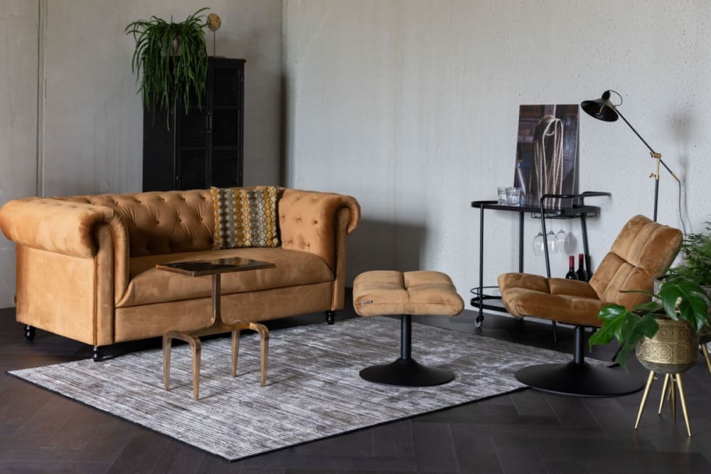 Tabouret repose pieds en velours doré