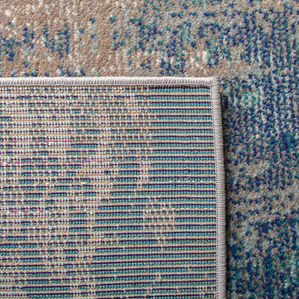 Tapis contemporain en polypropylène bleu/gris, 91 x 152 cm
