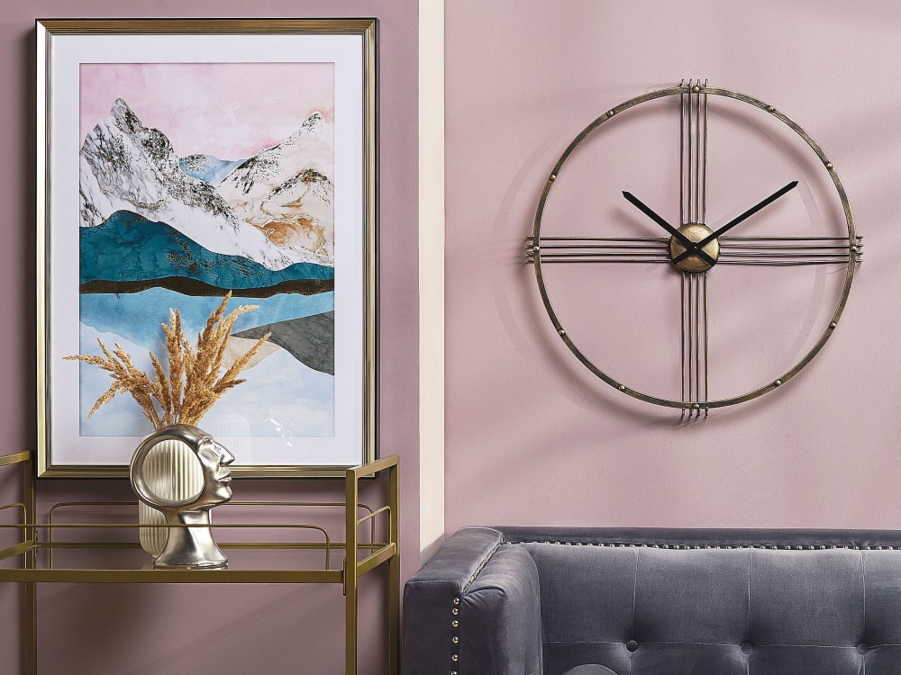 Horloge murale 64 cm métal doré
