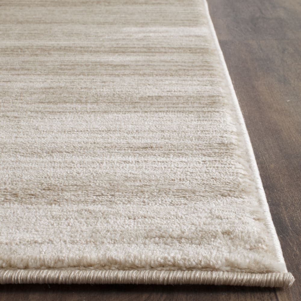 Tapis solide et tonale en polypropylène beige, 122 x 183 cm — vue 4