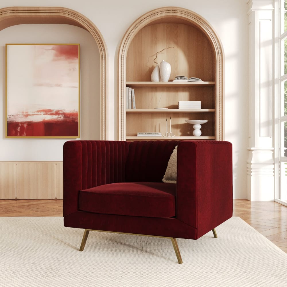 Poltrona in velluto bordeaux con gambe in metallo dorato - Maison