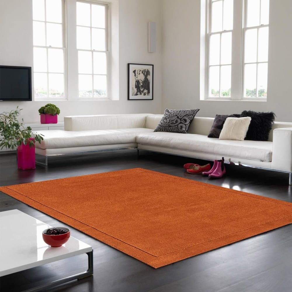 Tapis tufté main en laine corail 120x170 cm