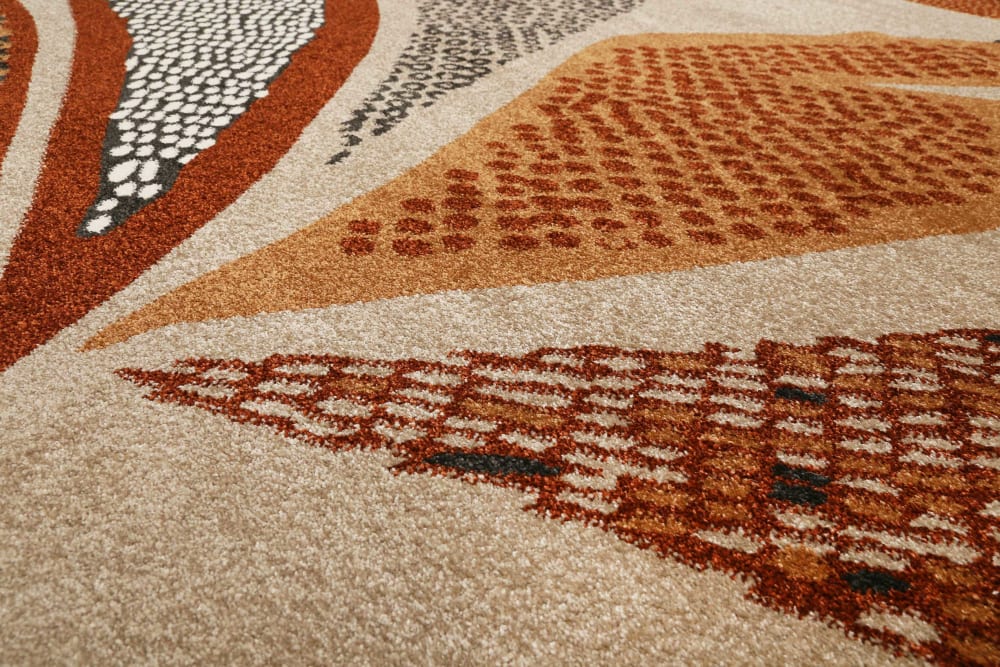 Tapis design motif végétal fond beige sable 133x200 — vue 4