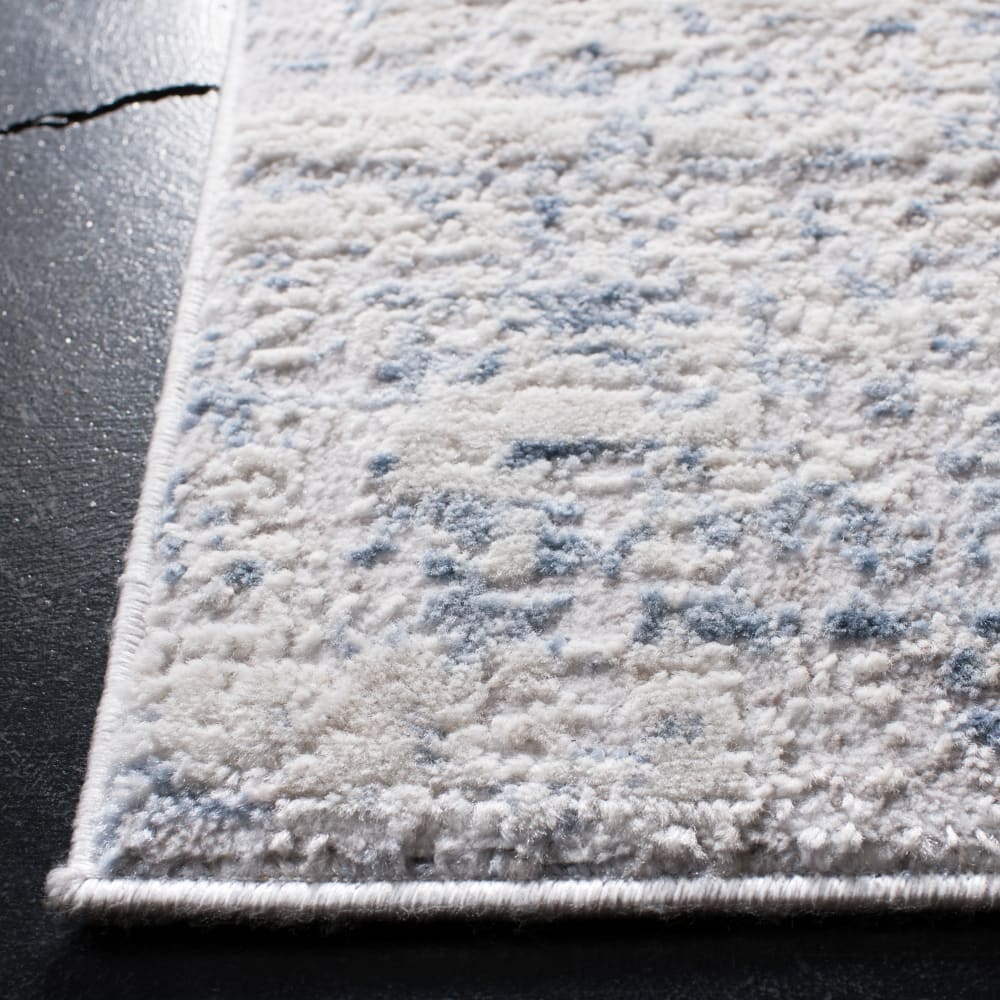 Tapis contemporain en polypropylène blanc/bleu, 91 x 152 cm — vue 4
