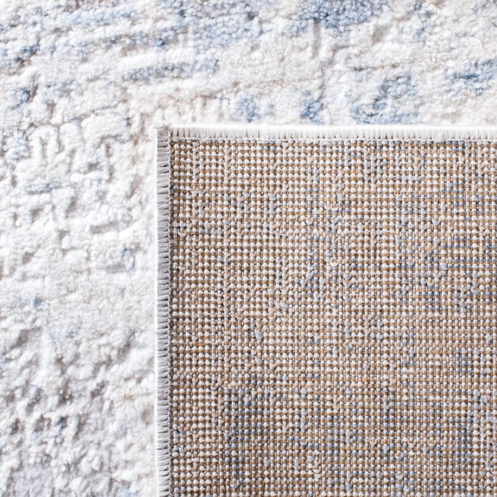 Tapis contemporain en polypropylène blanc/bleu, 122 x 183 cm — vue 4