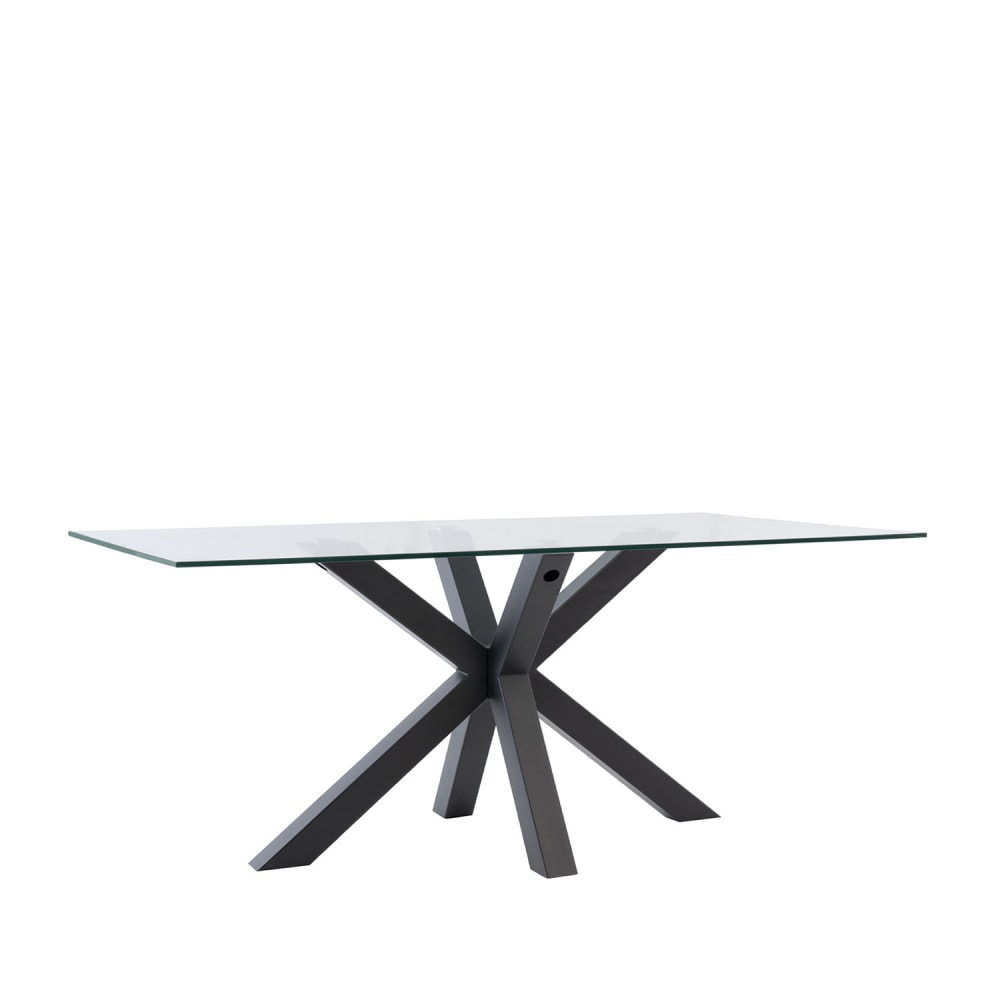 Mesa de comedor con tablero de vidrio y patas negras.