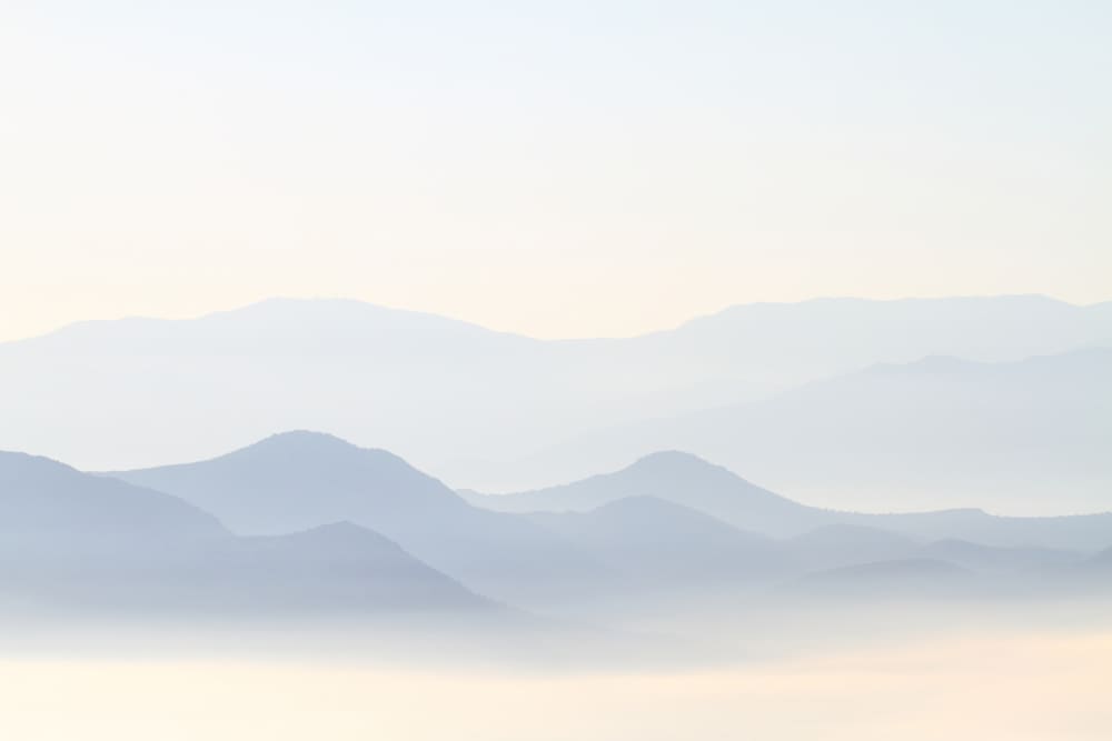 Carta da parati panoramica misty mountains, blu 255 x 250cm -