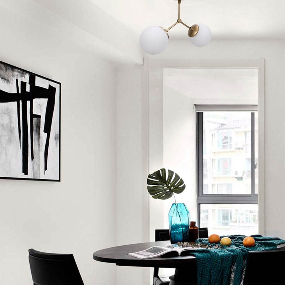 Plafonnier 2 lumières doré avec sphères en verre opale