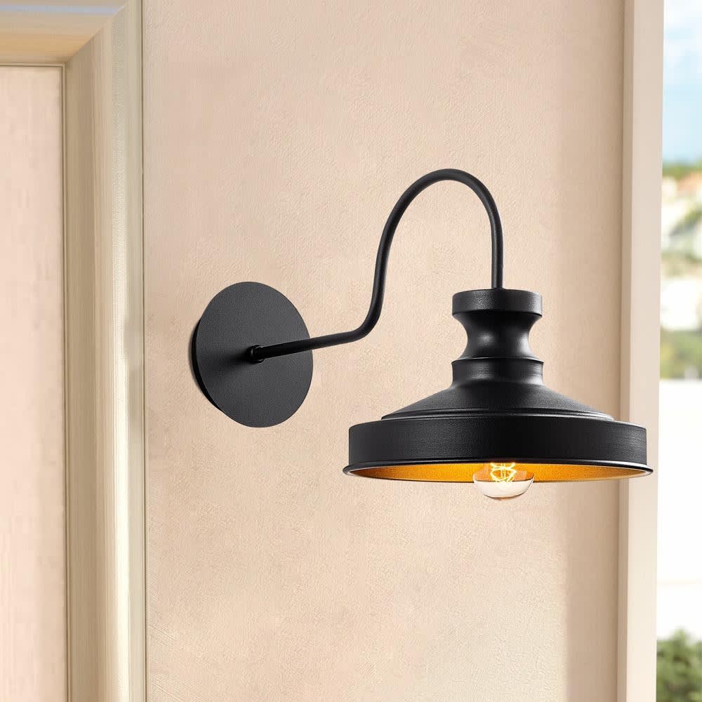 Schwarze Vintage-Wandleuchte mit geschwungener Struktur - Maisons