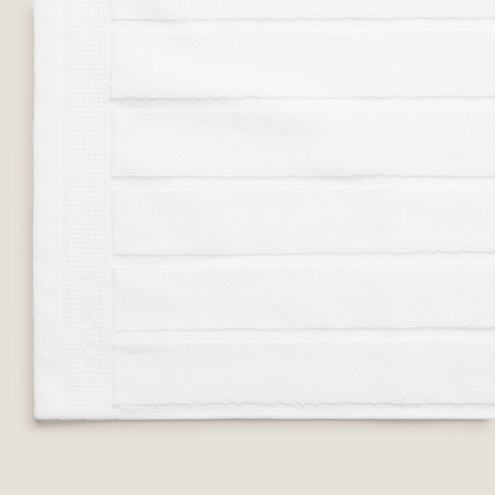 Alfombra de baño de algodón egipcio rizo color blanco. 50x70cm - Maisons du Monde