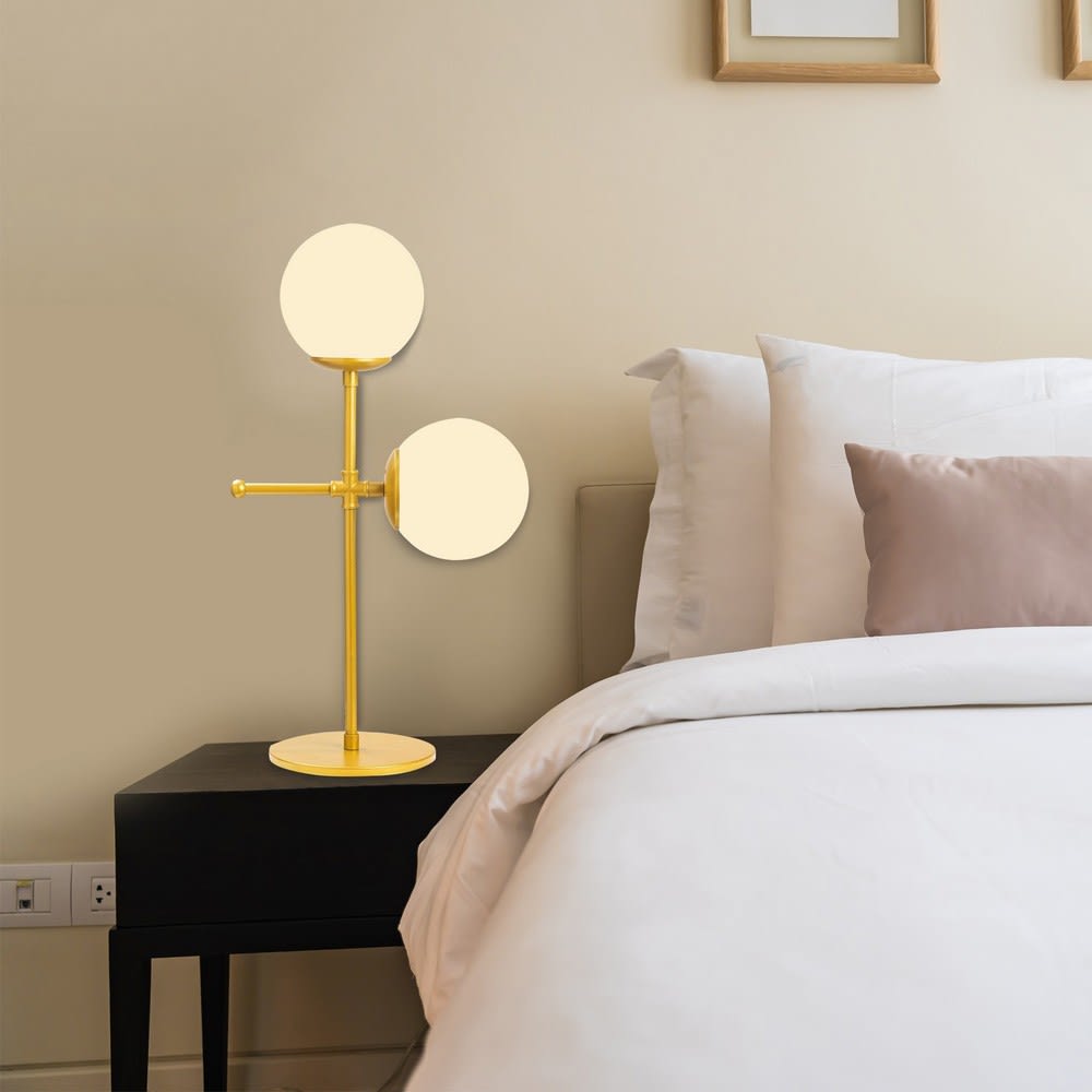 Lampe de table dorée 2 lumières avec sphères en verre blanc