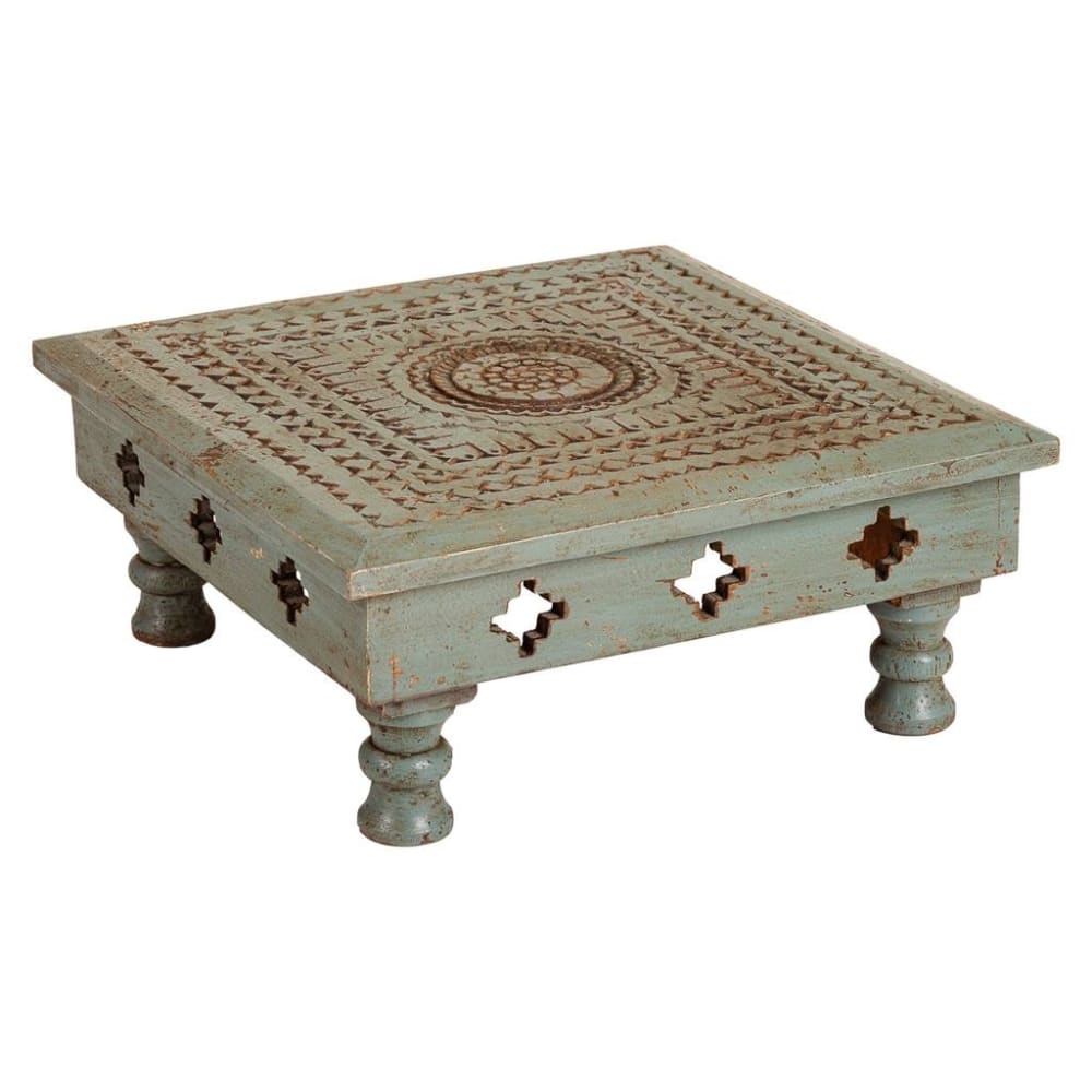 Mesa de centro de madera tallada acabado artesanal azul