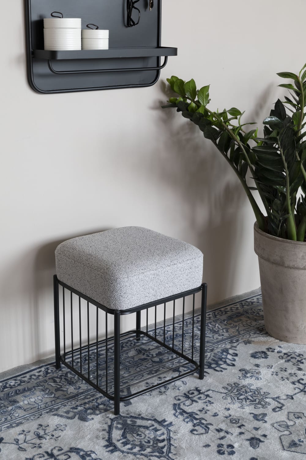 Tabouret en tissu gris