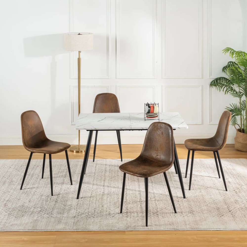 juego de mesa efecto marmol blanco y 4 sillas escandinavas