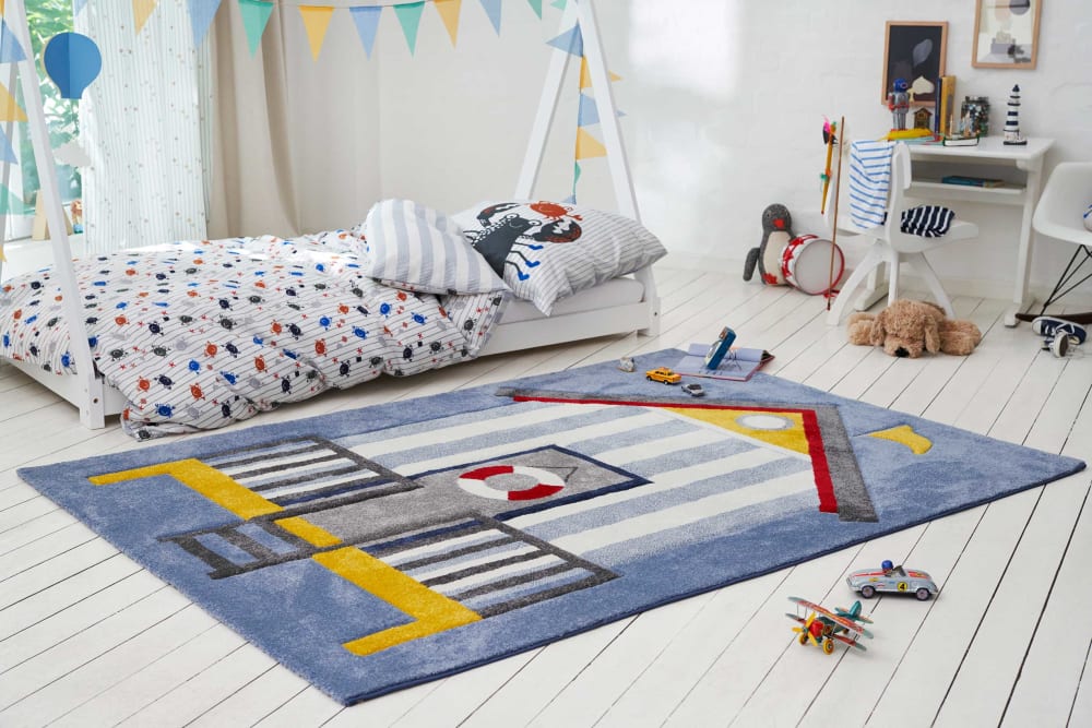 Blauer weicher Kinderteppich mit Strandhaus Motiv 160x225 -